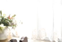 ‘잠이 보약’…일상 속 수면 혁명, 작지만 큰 변화부터 woman sleeping on bed beside book